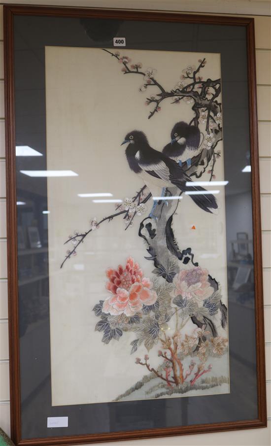 A Chinese silk panel of birds in prunus blossom, 35 x 18in.